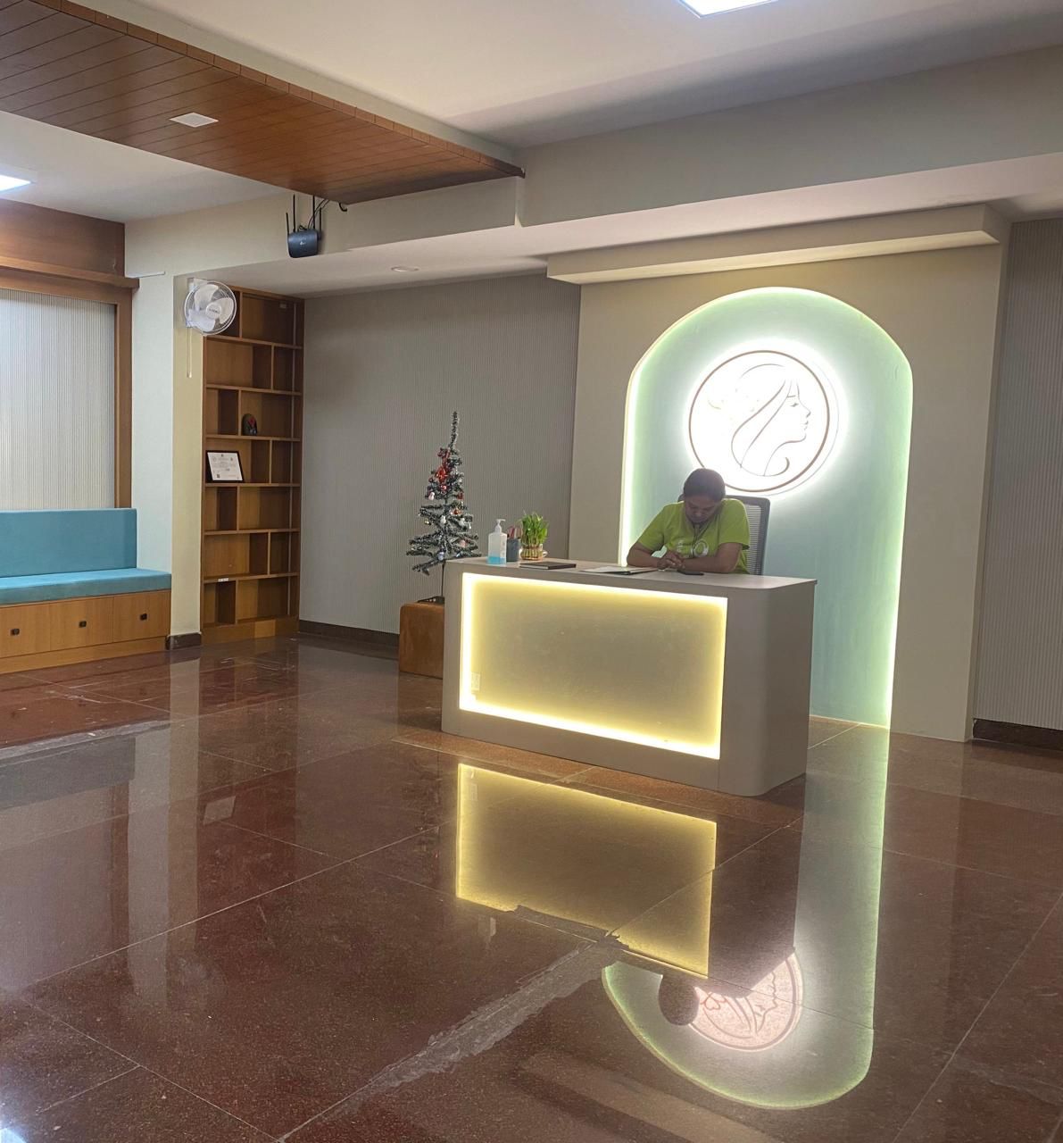 Reception desk reflecting My Stree emblem